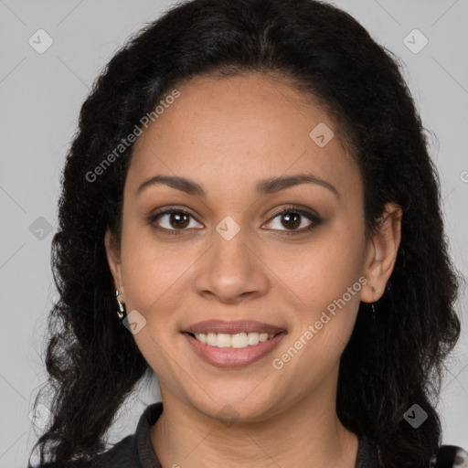 Joyful latino young-adult female with long  brown hair and brown eyes