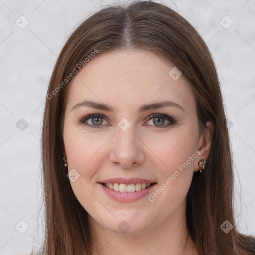 Joyful white young-adult female with long  brown hair and grey eyes