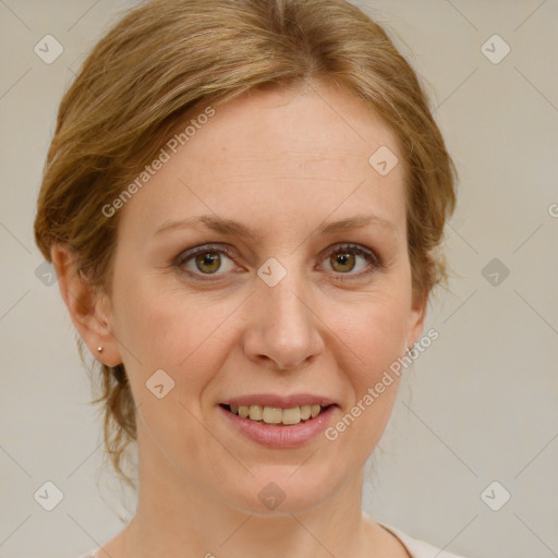 Joyful white adult female with medium  brown hair and blue eyes