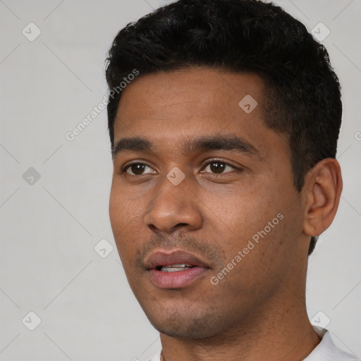Neutral black young-adult male with short  black hair and brown eyes