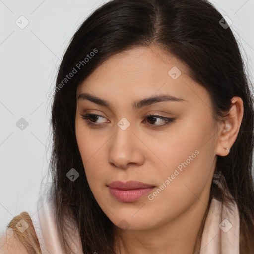 Joyful asian young-adult female with long  brown hair and brown eyes