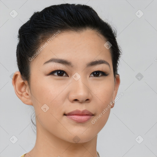 Joyful asian young-adult female with short  brown hair and brown eyes