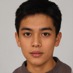 Neutral asian young-adult male with short  brown hair and brown eyes