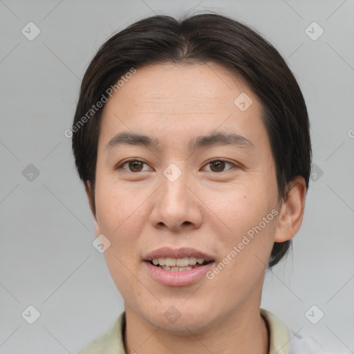 Joyful asian young-adult male with short  brown hair and brown eyes