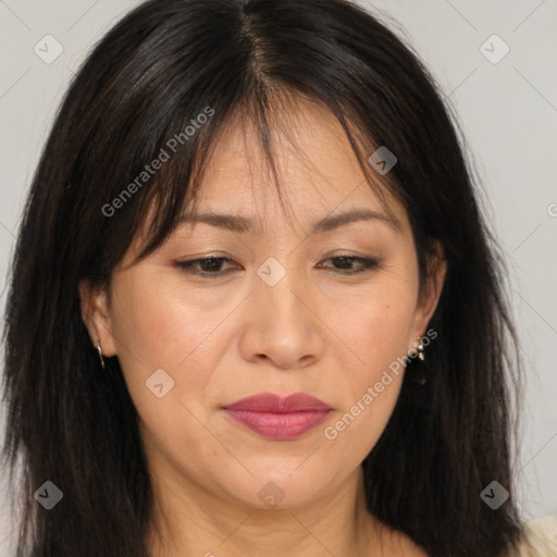 Joyful white adult female with medium  brown hair and brown eyes