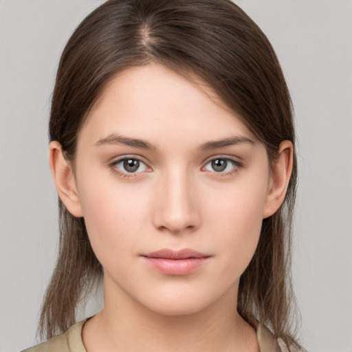 Neutral white young-adult female with medium  brown hair and brown eyes