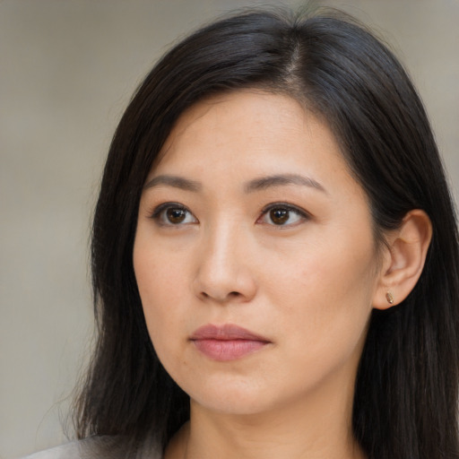 Neutral asian young-adult female with long  brown hair and brown eyes