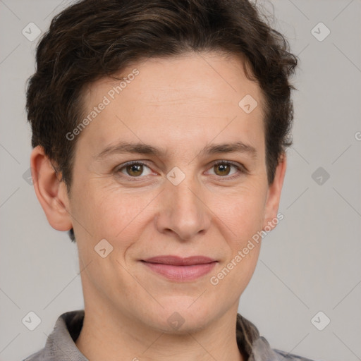 Joyful white adult female with short  brown hair and grey eyes