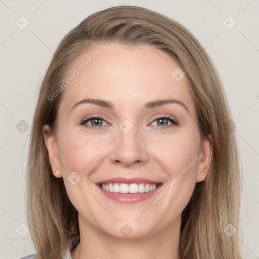 Joyful white young-adult female with long  brown hair and grey eyes