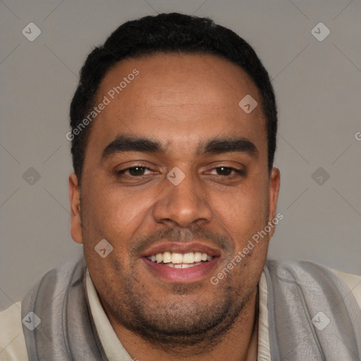 Joyful black young-adult male with short  black hair and brown eyes