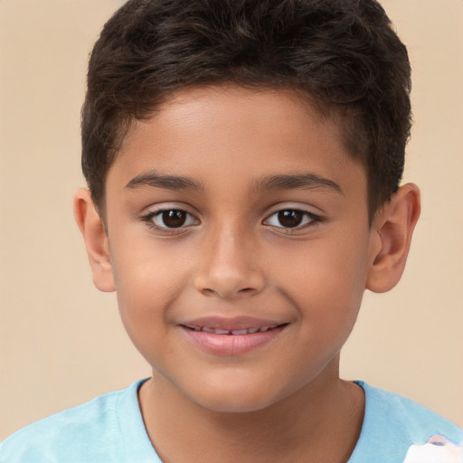 Joyful white child male with short  brown hair and brown eyes