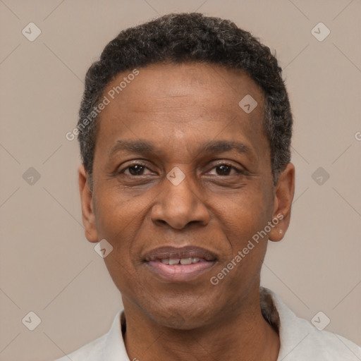 Joyful latino adult male with short  black hair and brown eyes