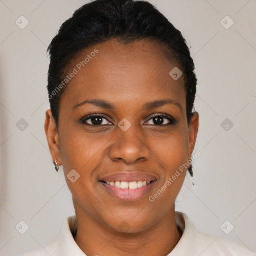 Joyful black young-adult female with short  brown hair and brown eyes