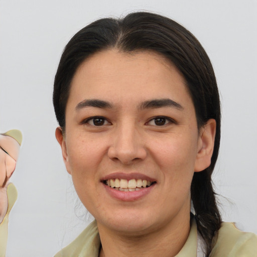 Joyful white young-adult female with medium  brown hair and brown eyes