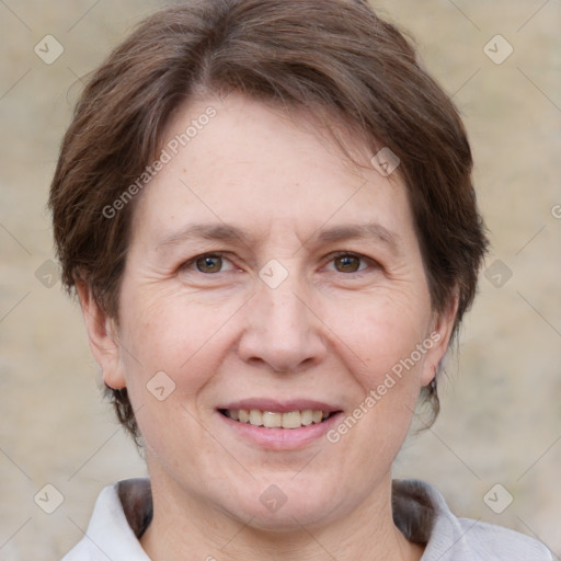 Joyful white adult female with short  brown hair and brown eyes