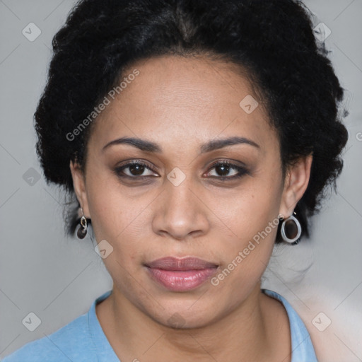 Joyful latino adult female with short  brown hair and brown eyes