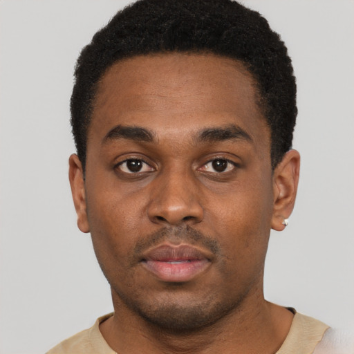 Neutral black young-adult male with short  black hair and brown eyes