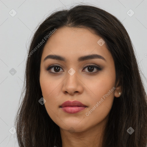 Neutral latino young-adult female with long  brown hair and brown eyes