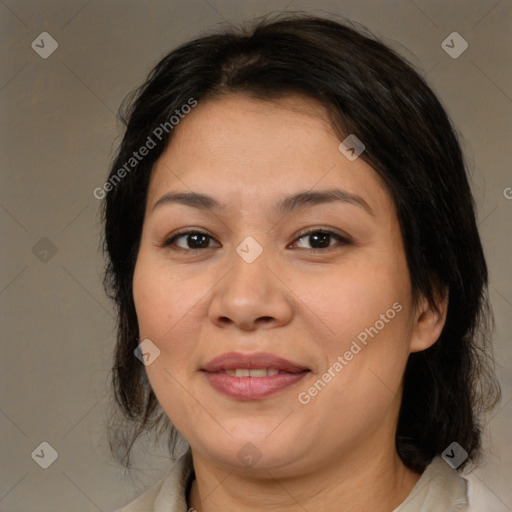 Joyful white adult female with medium  brown hair and brown eyes