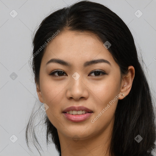 Joyful asian young-adult female with long  brown hair and brown eyes