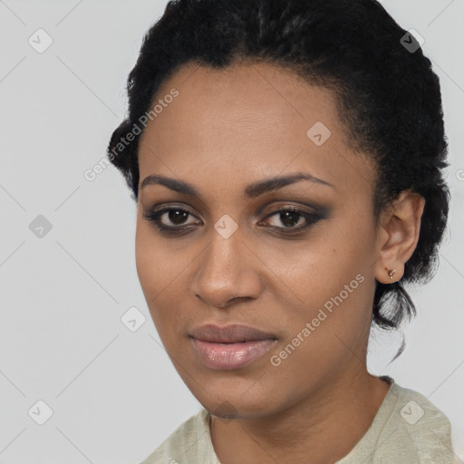 Joyful latino young-adult female with short  black hair and brown eyes