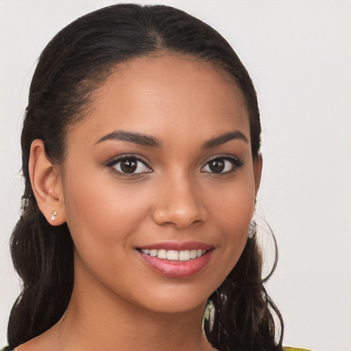 Joyful white young-adult female with long  brown hair and brown eyes