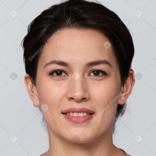 Joyful white young-adult female with short  brown hair and brown eyes