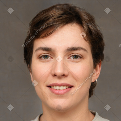 Joyful white young-adult female with short  brown hair and grey eyes