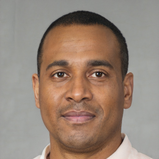 Neutral black young-adult male with short  black hair and brown eyes
