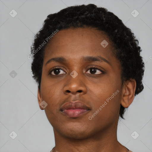 Neutral black young-adult female with short  brown hair and brown eyes