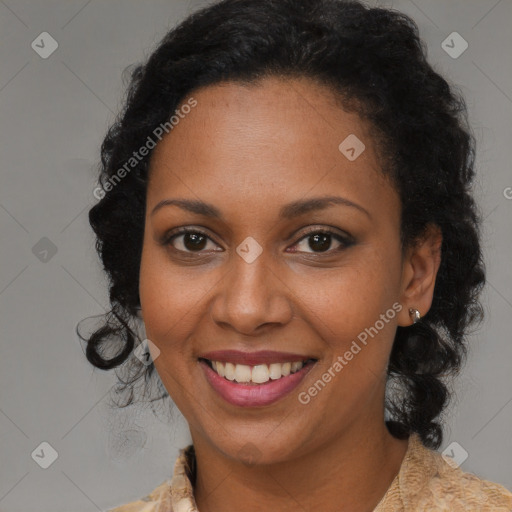 Joyful black young-adult female with medium  brown hair and brown eyes