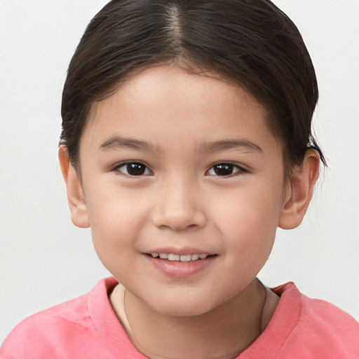 Joyful white child female with short  brown hair and brown eyes