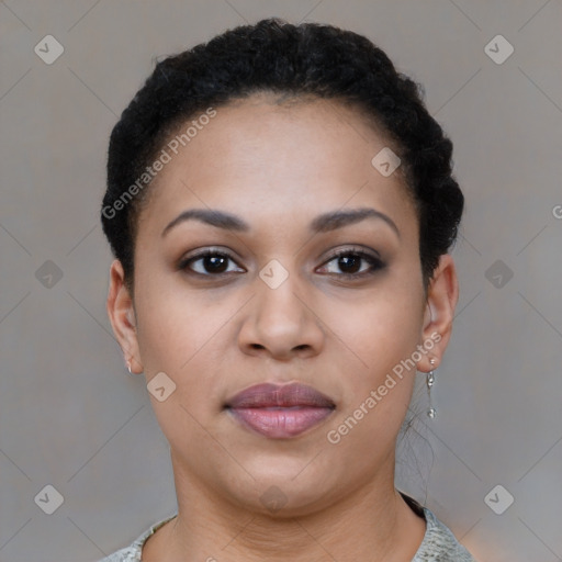 Joyful latino young-adult female with short  black hair and brown eyes