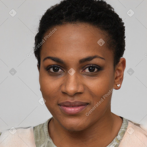 Joyful black young-adult female with short  black hair and brown eyes