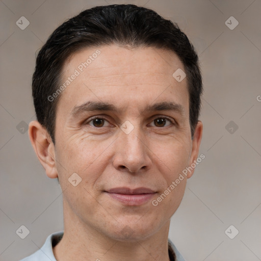 Joyful white adult male with short  brown hair and brown eyes