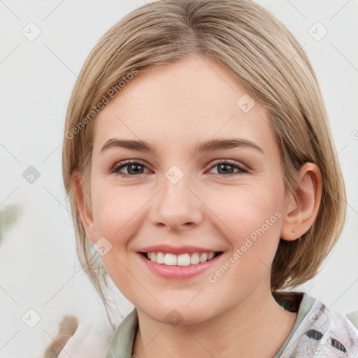 Joyful white young-adult female with medium  brown hair and blue eyes