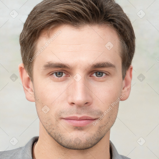 Neutral white young-adult male with short  brown hair and grey eyes