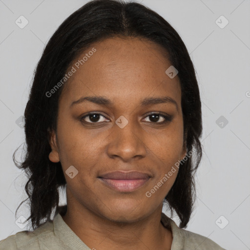 Joyful black young-adult female with medium  brown hair and brown eyes