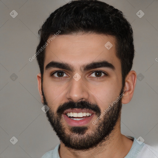 Joyful white young-adult male with short  black hair and brown eyes