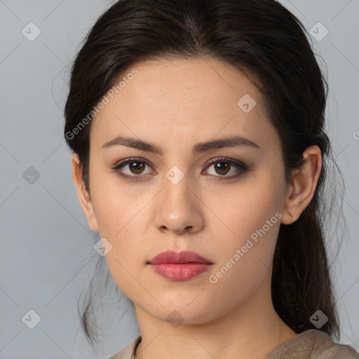 Neutral white young-adult female with medium  brown hair and brown eyes