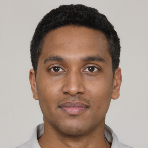 Neutral black young-adult male with short  black hair and brown eyes