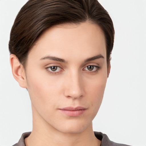 Neutral white young-adult female with short  brown hair and brown eyes