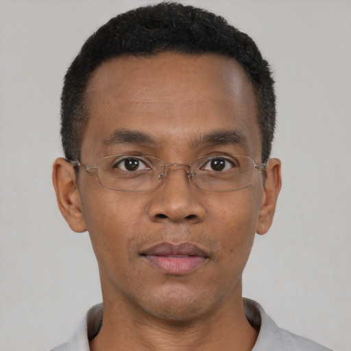Neutral black young-adult male with short  black hair and brown eyes