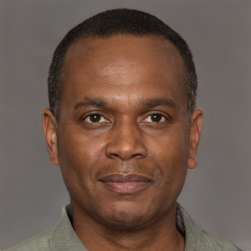 Neutral latino adult male with short  brown hair and brown eyes