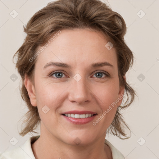 Joyful white young-adult female with medium  brown hair and blue eyes