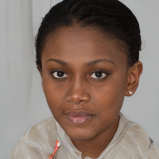 Neutral black young-adult female with short  brown hair and brown eyes