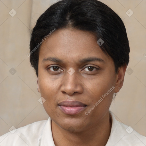 Joyful latino young-adult female with short  brown hair and brown eyes