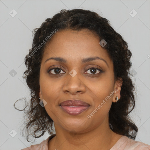 Joyful black young-adult female with medium  brown hair and brown eyes