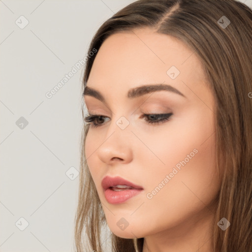 Neutral white young-adult female with long  brown hair and brown eyes