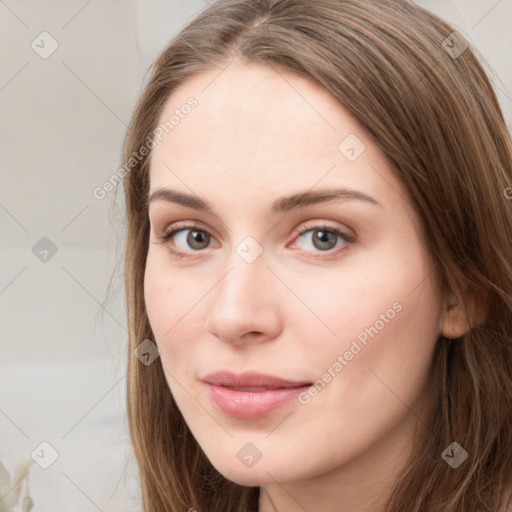 Neutral white young-adult female with long  brown hair and grey eyes